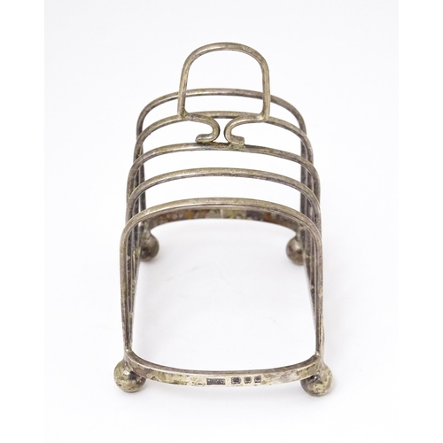 319 - An Art Deco silver five bar toast rack hallmarked London 1929 maker J B Chatterley & Sons Ltd. 4