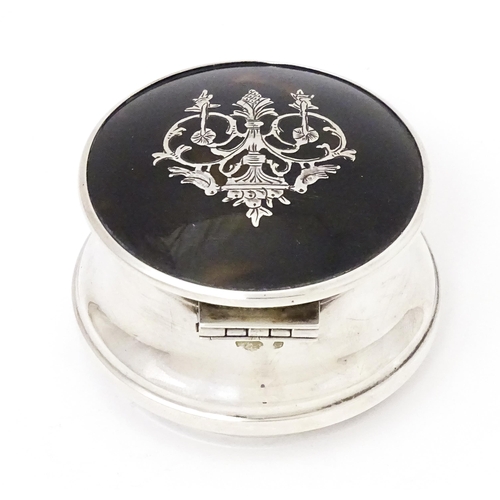 339 - A silver ring box with hinged lid having domed tortoiseshell and pique work decoration, hallmarked L... 