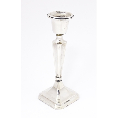 340 - A silver candlestick hallmarked Birmingham 1915 maker Henry Williamson Ltd Approx. 6