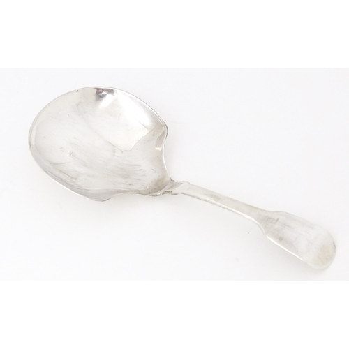 347 - A silver Fiddle pattern caddy spoon hallmarked London 1827 maker G.W. Approx. 4