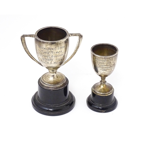351 - Two silver miniature trophy cups, one hallmarked Birmingham 1930 maker William Aitken the other Shef... 