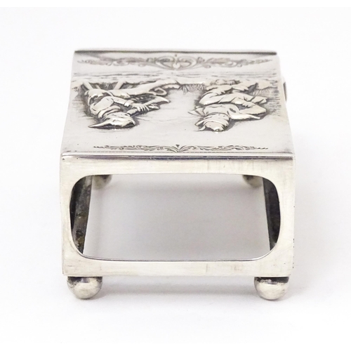 362 - A silver matchbox cover / sleeve with embossed decoration, hallmarked Birmingham (early 20thC) Maker... 