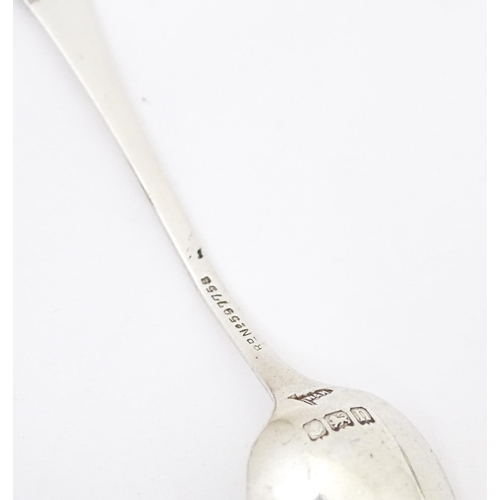 371 - Three assorted spoons to include two silver examples, one titled 'baby' and hallmarked Glasgow 1928 ... 