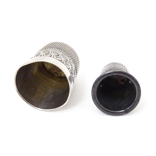 373 - Two white metal thimbles, one titled ' For a good girl  (2)