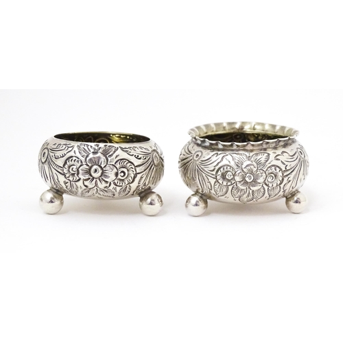 375 - Two Victorian silver salts with embossed decoration, one hallmarked Birmingham 18189 / 1890 maker St... 