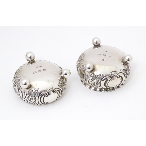 375 - Two Victorian silver salts with embossed decoration, one hallmarked Birmingham 18189 / 1890 maker St... 