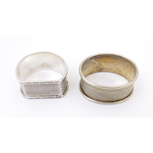 381 - Two napkin rings with engine turned decoration . One of D-shape hallmarked Birmingham 1937 maker Cri... 