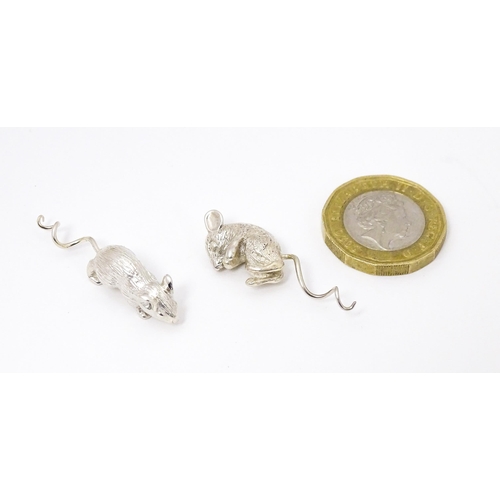 393 - Two silver models of mice , possibly for use on a cork or a small scent bottle, one formed as a runn... 