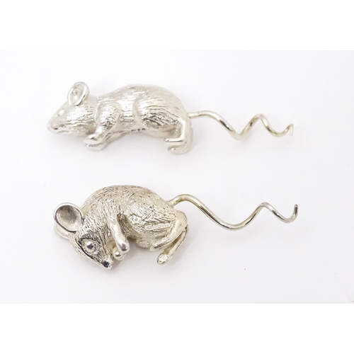 393 - Two silver models of mice , possibly for use on a cork or a small scent bottle, one formed as a runn... 