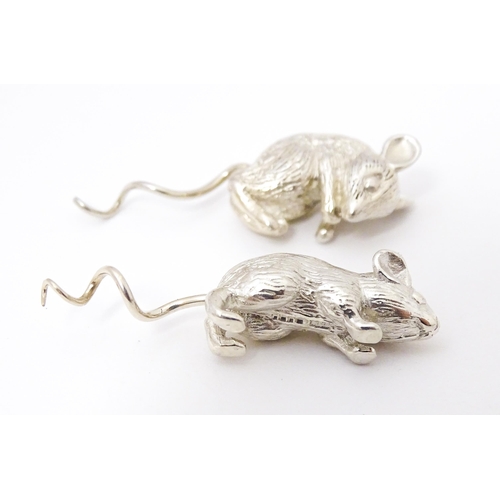 393 - Two silver models of mice , possibly for use on a cork or a small scent bottle, one formed as a runn... 