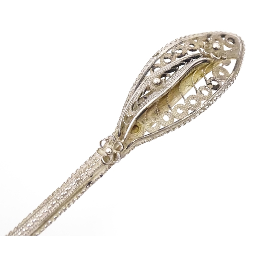 400 - A Continental .830 silver soon with filigree decoration to handle. Indistinctly marked. Possibly Sca... 