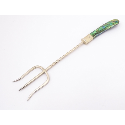 406 - A silver bread fork with abalone / paua shell handle bearing marks for Jim Cotterill of Wellington N... 