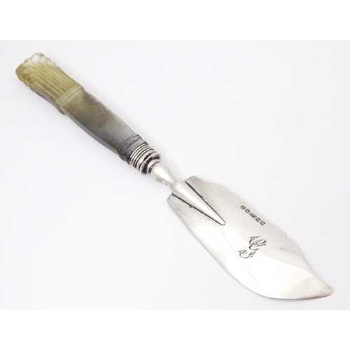 407 - A silver butter knife with mother of pearl handle, hallmarked Birmingham c.1831 maker Francis Clark.... 