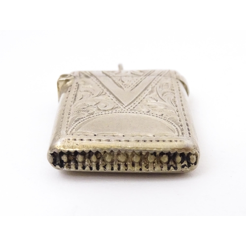 409 - A silver vesta with engraved decoration, hallmarked Birmingham 1903 maker Arthur Cook.  Approx. 1 1/... 