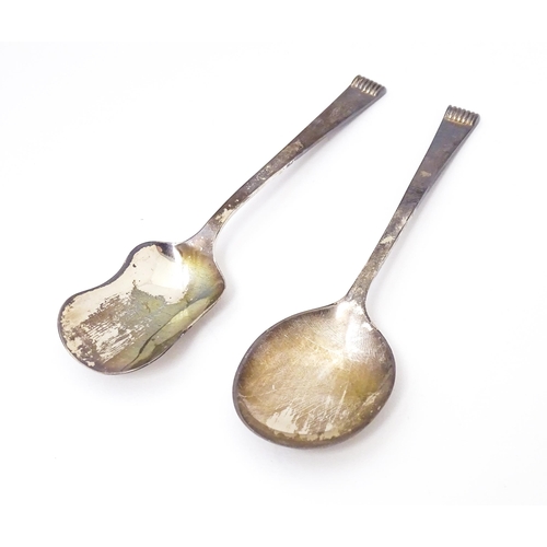 411 - Two cased silver spoons comprising a sugar spoon of shovel form and a preserve spoon. Hallmark Sheff... 