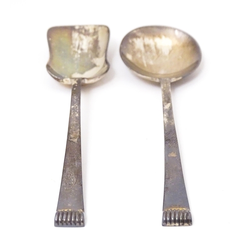 411 - Two cased silver spoons comprising a sugar spoon of shovel form and a preserve spoon. Hallmark Sheff... 