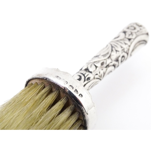 418 - A Victorian silver handled hat brush, hallmarked Chester 1896 maker Cornelius Desormeaux Saunders & ... 