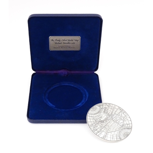 419 - A cased limited edition commemorative silver medallion titled 'The Drake Silver Medal Map, Michael M... 