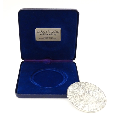 419 - A cased limited edition commemorative silver medallion titled 'The Drake Silver Medal Map, Michael M... 