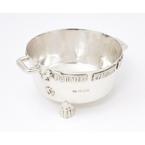 420 - A silver Arts and Crafts style bowl modelled as The Winchester Bushel, with hammered decoration, app... 