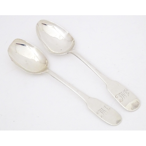 427 - Two Geo IV silver Fiddle pattern teaspoons, hallmarked Newcastle 1822, maker Thomas Watson. Approx. ... 