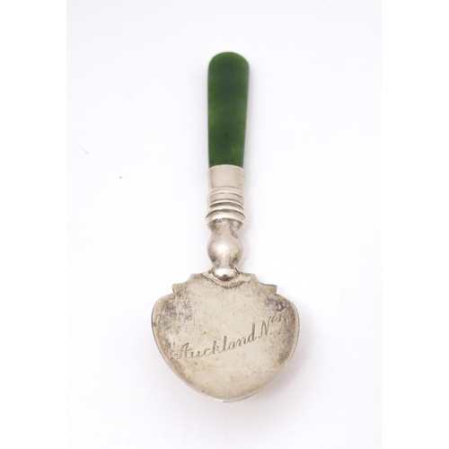 429 - A silver souvenir spoon with a New Zealand jade nephrite handle, the bowl engraved Auckland N. Z. Ha... 