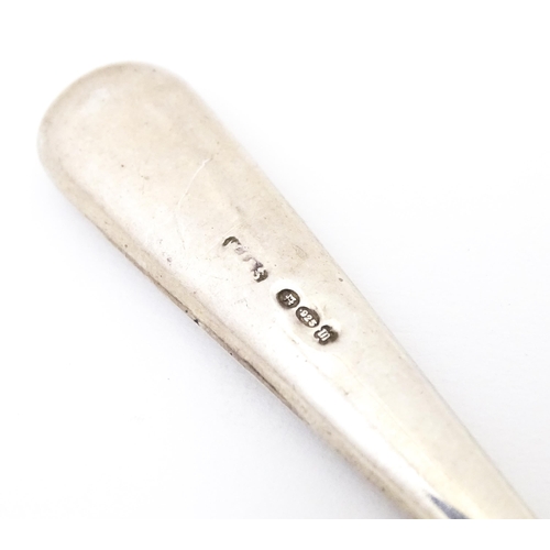 430 - A silver handled bread fork, hallmarked Birmingham 1901, maker E. S. Barnsley & Co. Together with a ... 