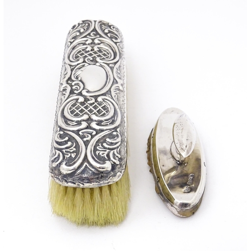 432 - A silver handled brush with embossed decoration, hallmarked Birmingham 1899, maker Thomas Hayes. Tog... 