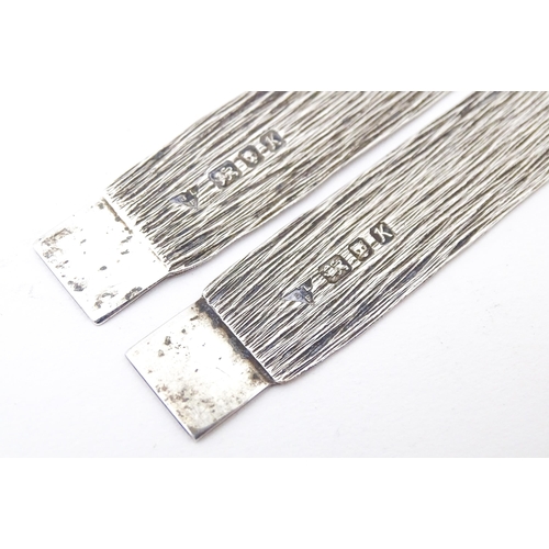 438 - Two Elizabeth II silver bookmarks with textured finish, hallmarked London 1984, maker Brian Leslie F... 