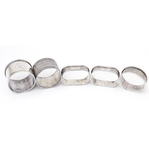 441 - Five assorted silver napkin rings to include two hallmarked Birmingham 1960,  one marked Sterling, o... 