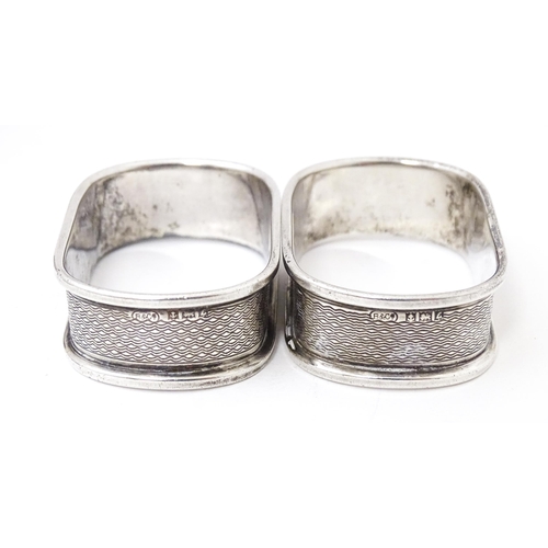 441 - Five assorted silver napkin rings to include two hallmarked Birmingham 1960,  one marked Sterling, o... 