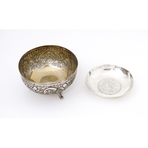 455 - A Continental .830 silver bowl with embossed decoration. 3 1/4