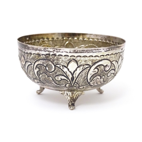 455 - A Continental .830 silver bowl with embossed decoration. 3 1/4