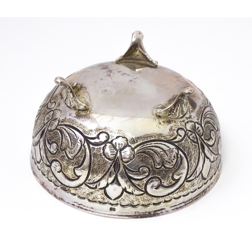 455 - A Continental .830 silver bowl with embossed decoration. 3 1/4