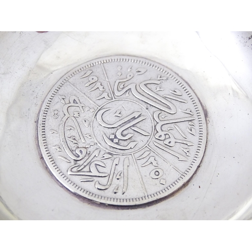 455 - A Continental .830 silver bowl with embossed decoration. 3 1/4