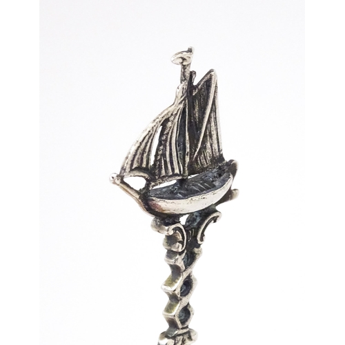 456 - A Continental .833 silver spoon with pierced decoration to bowl and sailing boat to handle. Indistin... 