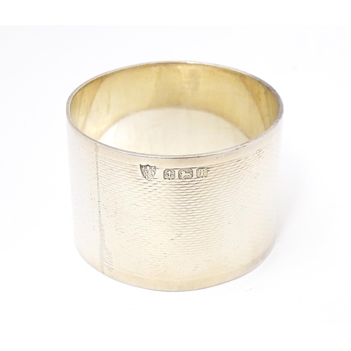 470 - Assorted silver items including a napkin ring hallmarked Birmingham 1943 maker J B Chatterley & Sons... 