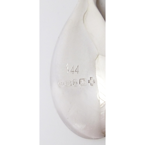 485 - A silver limited edition Millennium commemorative spoon. Hallmarked Birmingham 2000 maker A Edward J... 