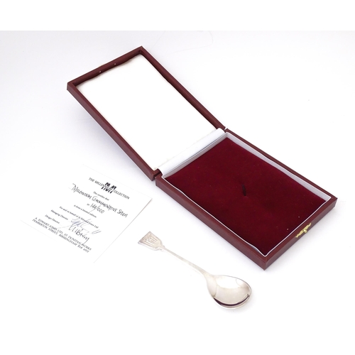 485 - A silver limited edition Millennium commemorative spoon. Hallmarked Birmingham 2000 maker A Edward J... 