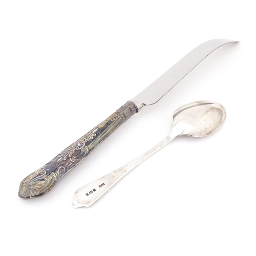 493 - A silver handled Grapefruit knife hallmarked Sheffield 1977 maker Harrison Brothers together with a ... 