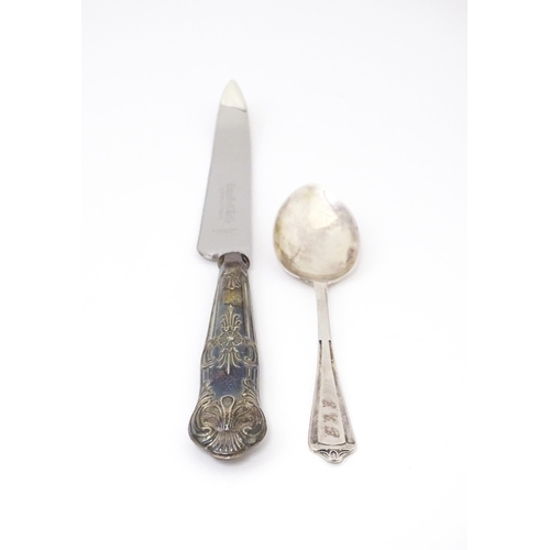 493 - A silver handled Grapefruit knife hallmarked Sheffield 1977 maker Harrison Brothers together with a ... 