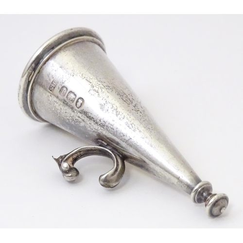 498 - A 19thC silver candle snuffer of conical form. Hallmarked London 1826 maker Benjamin Smith III.