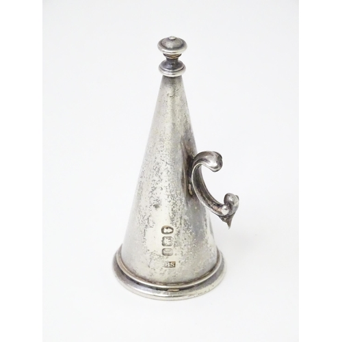 498 - A 19thC silver candle snuffer of conical form. Hallmarked London 1826 maker Benjamin Smith III.