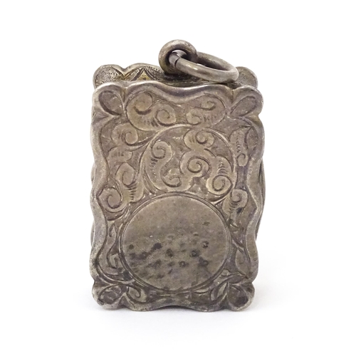 501 - A Victorian silver vinaigrette, the hinged lid opening to reveal hinged grill and gilded interior, h... 