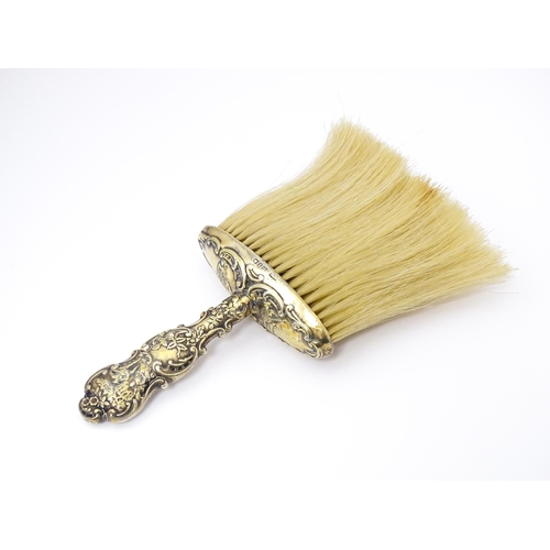 503 - A silver gilt handled hat brush hallmarked Birmingham 1899 maker Levi & Salaman. Approx 7