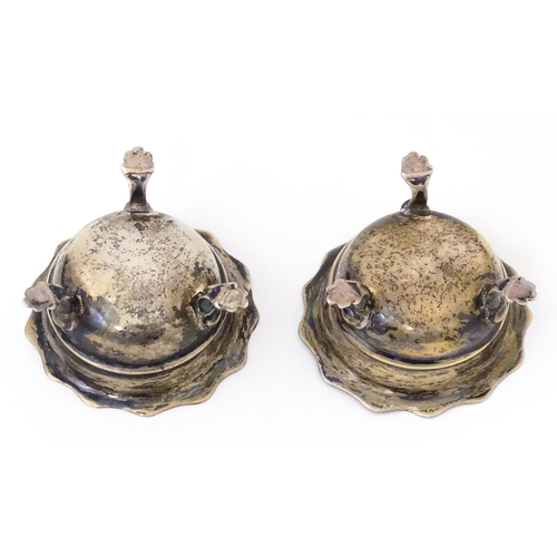 506 - A pair of silver salts raised on three feet. Hallmarked Birmingham 1904 maker F & D. Each approx. 1 ... 