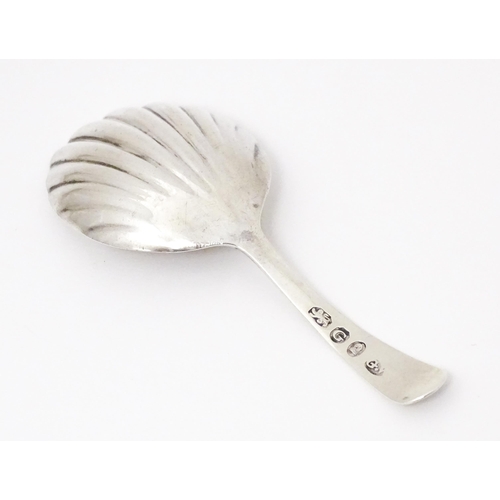 507 - A Geo III silver caddy spoon with shell formed bowl, hallmarked London 1802 maker George Wintle. App... 