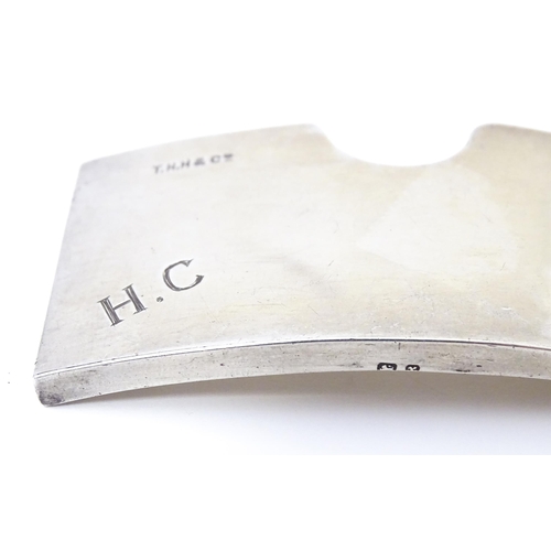 563 - A Victorian silver card case of shaped form. Hallmarked Birmingham 1899 maker T H Hazlewood & Co. Ap... 