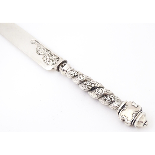 571 - A Victorian silver knife , with hallmarked handle and blade, London 1867 maker Francis Higgins II. 7... 