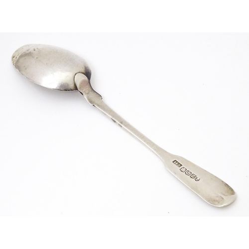 578 - A 19thC Scottish silver fiddle pattern teaspoon hallmarked Edinburgh 1831 maker HS (SH). Approx 5 1/... 